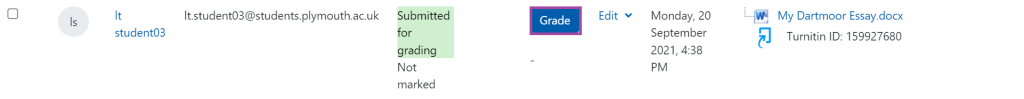 Screenshot of the blue 'Grade' button (highlighted) next to a student submission.